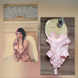 melanie martinez pink lace and ribbon silk victoria secret teddy with small rip